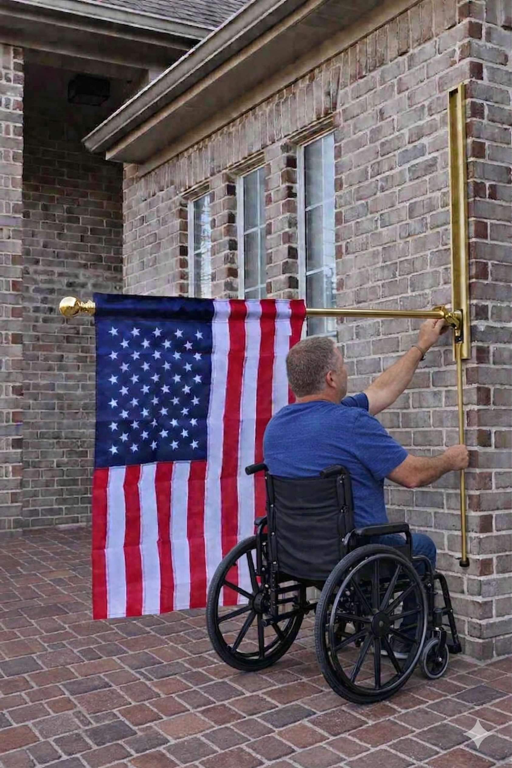 Person in wheelchair using VersaMAST in lowered position