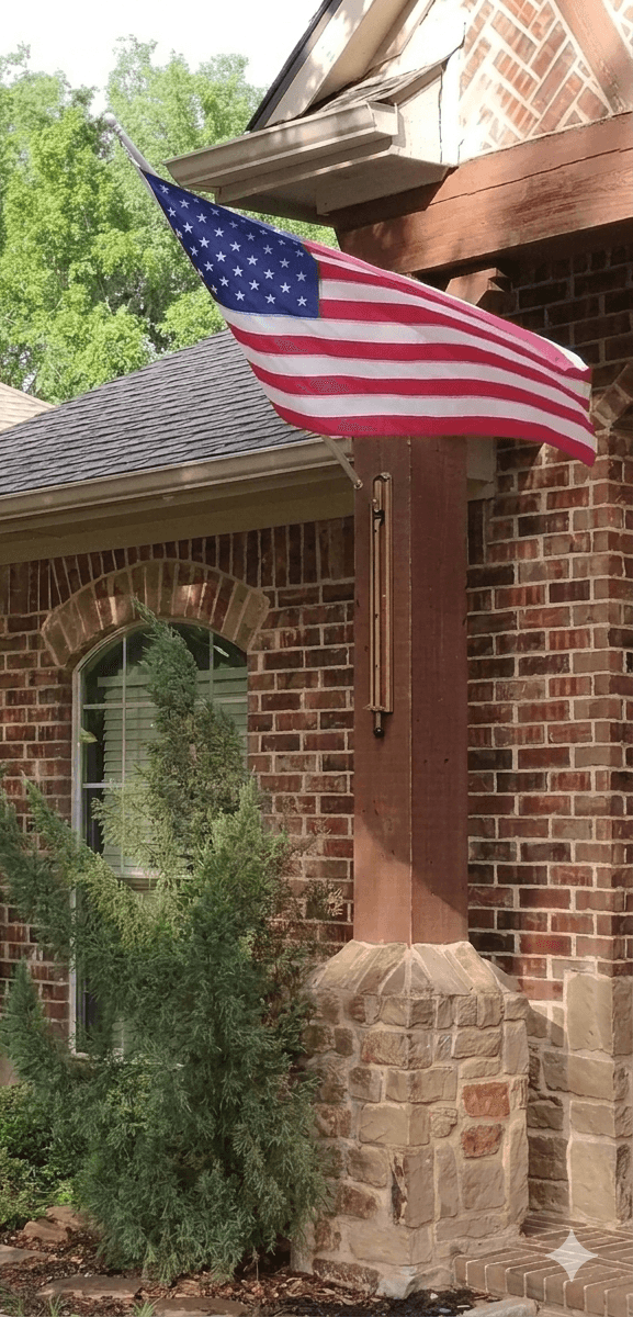 American flag flying from a VersaMAST mount that lowers to a comfortable height for seniors
